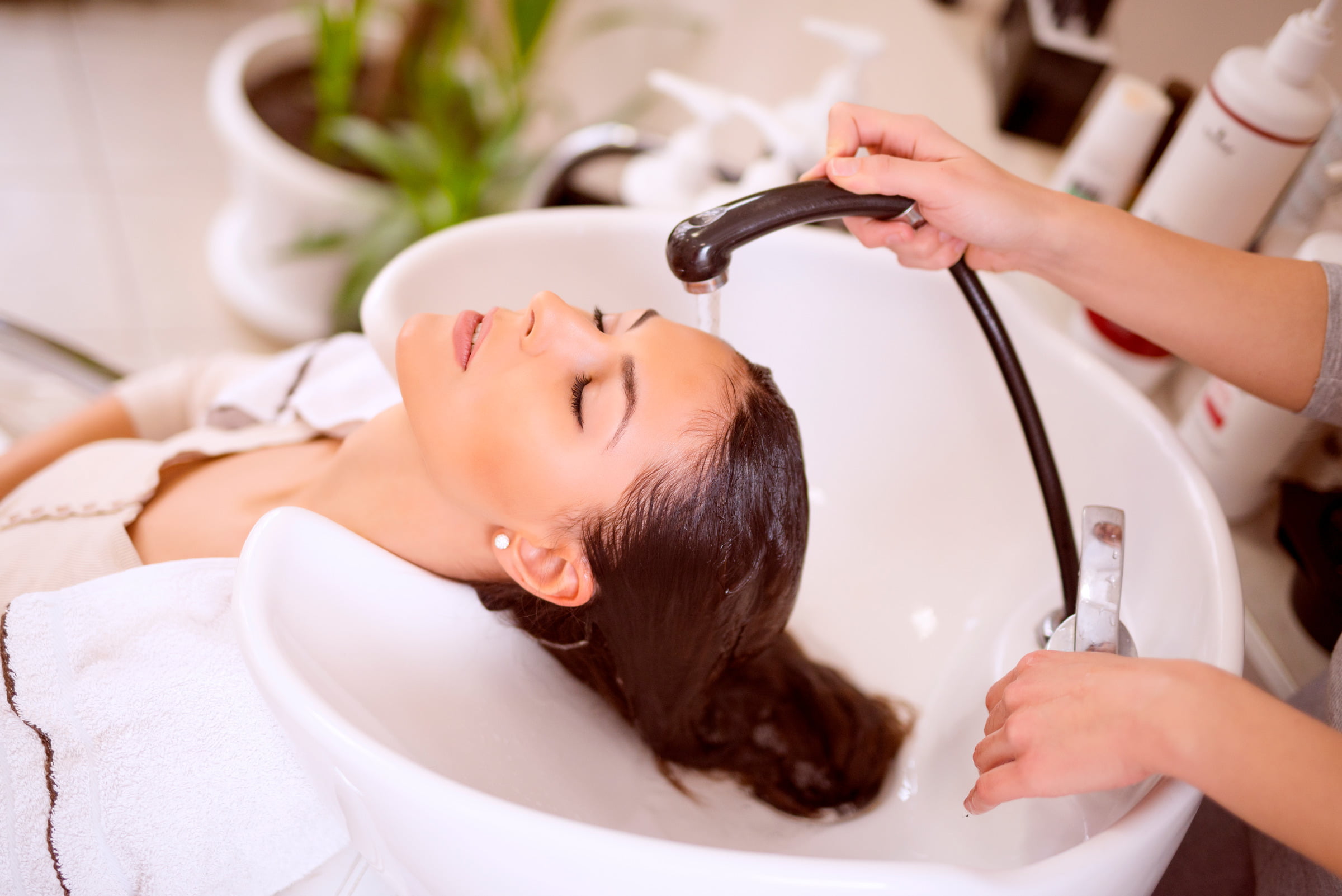 Deep conditioning treatment restoring hydration for soft, healthy hair.